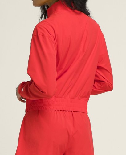 Кофта Wilson жен. TEAM WOVEN JACKET INFRARED красный MD